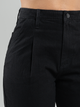 Ref: 064110 Pantalon slouchy rígido, tiro alto, tono negro, con prenses