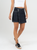 Ref: 064596 falda short, confort, tiro alto con delantero cruzado, tono azul oscuro, detalle tela denim con brillo.