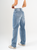 Ref: 065555 Jean barrel, stretch, tiro medio, diseño cinco bolsillos, tono azul medio claro.