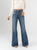 Ref: 065692 Jean mom Flare, rígido, tiro medio, detalle en costado, tono azul medio oscuro