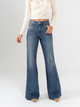 Ref: 065692 Jean mom Flare, rígido, tiro medio, detalle en costado, tono azul medio oscuro