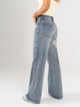 Ref: 065693 Jean mom Flare, rígido, tiro medio, detalle en costado, tono azul medio