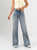 Ref: 065693 Jean mom Flare, rígido, tiro medio, detalle en costado, tono azul medio