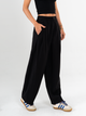 Ref: 069595 Pantalón barrel, tejido plano liviano, tiro medio, con prenses, tono negro