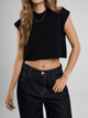Ref: 0610403 Crop top tejido acanalado, cuello alto, tono negro.