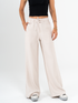 Ref: 069625 Pantalón mom flare, sin prense, corte delantero, pretina con resorte, tono arena