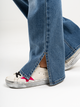 Ref: 065574 Jean semi flare, stretch, tiro alto, con abertura en ruedo, azul medio