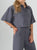 Ref: 0610057 Camisa tejido plano liviano, tono gris, manga corta