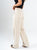 Ref: 069655 Pantalón straight leg, tiro alto, tejido plano liviano, detalle cierres, tono arena