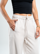 Ref: 069625 Pantalón mom flare, sin prense, corte delantero, pretina con resorte, tono arena
