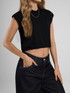 Ref: 0610403 Crop top tejido acanalado, cuello alto, tono negro.