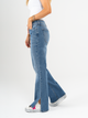 Ref: 065574 Jean semi flare, stretch, tiro alto, con abertura en ruedo, azul medio