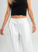 Ref: 069672 Pantalón barrel, tono ivory, pretina con elástico, tiro alto, tejido plano liviano efecto satinado