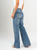 Ref: 065594 Jean mom flare, rígido, tiro alto, detalle en pretina, tono azul medio