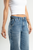 Ref: 065594 Jean mom flare, rígido, tiro alto, detalle en pretina, tono azul medio