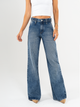 Ref: 065593 Jean mom flare, rígido, tiro alto, detalle en pretina, tono azul medio oscuro