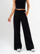 Ref: 069623 Pantalón mom flare, sin prense, corte delantero, pretina con resorte, tono negro