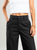 Ref: 069674 Pantalón mom flare, sin prense, tejido plano liviano, tiro alto, vivo en costado, tono negro